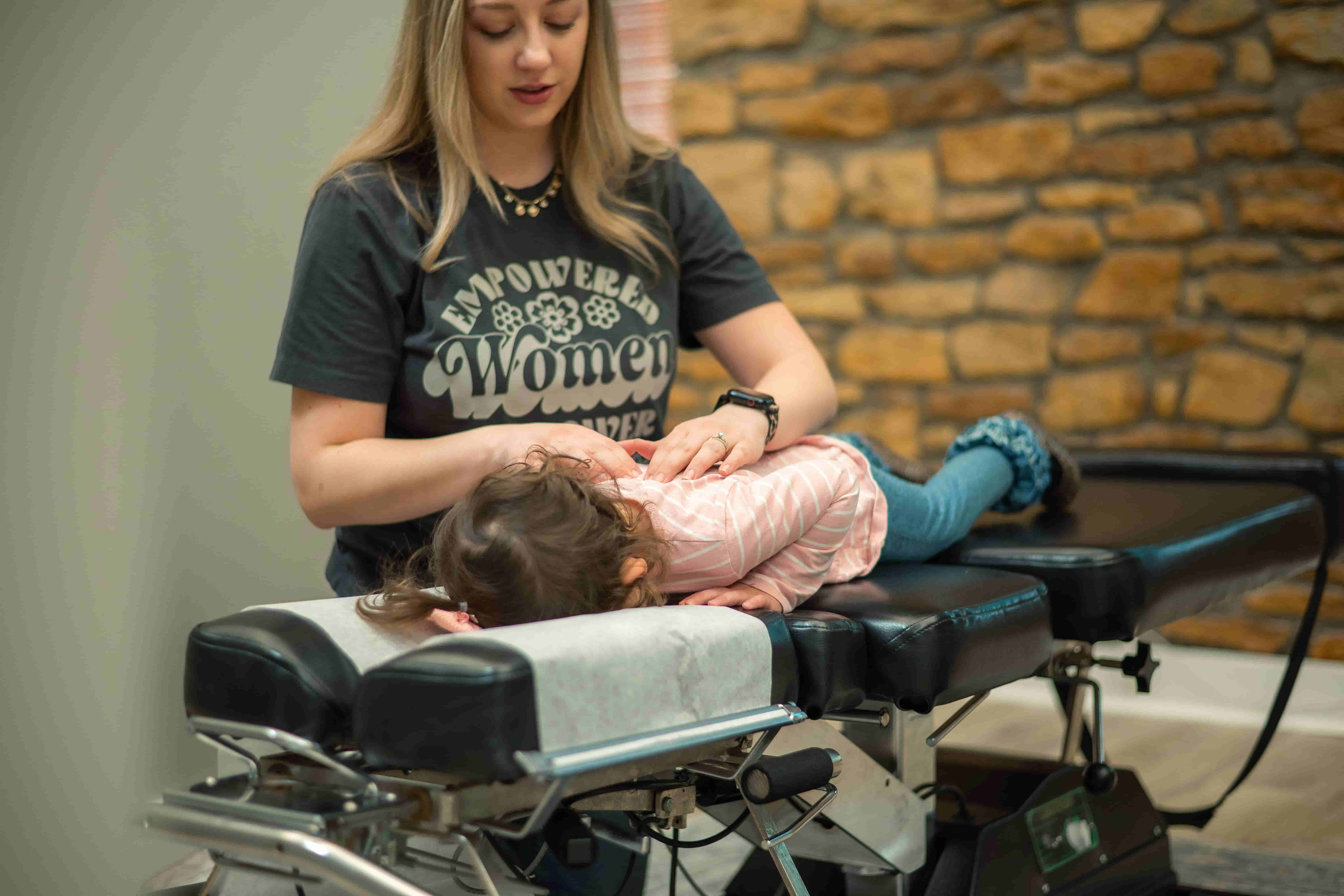 Mother and infant chiropractic appointment - family wellness care in Topeka Kansas