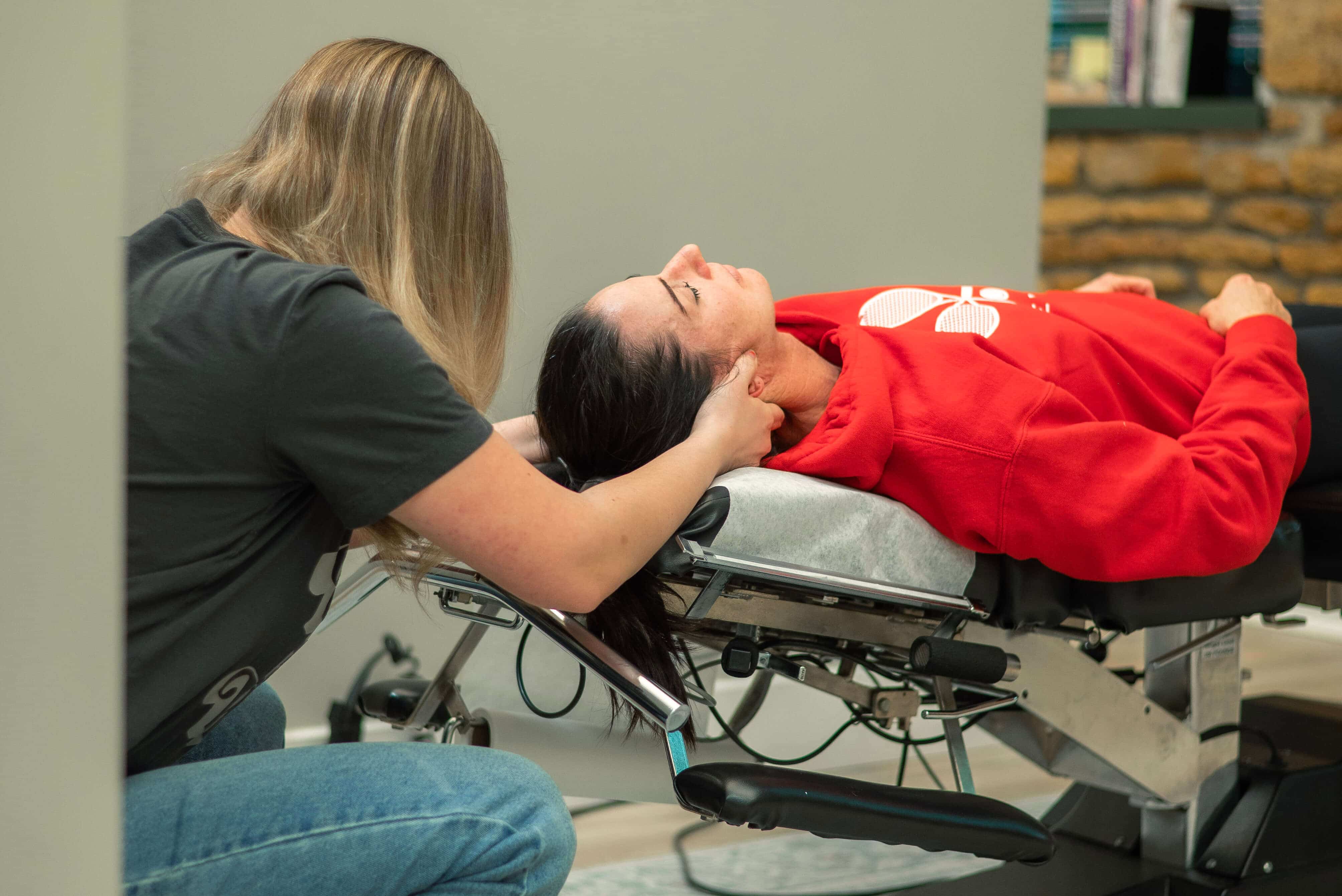 Gentle pediatric chiropractic adjustment for child in Topeka focusing on nervous system health